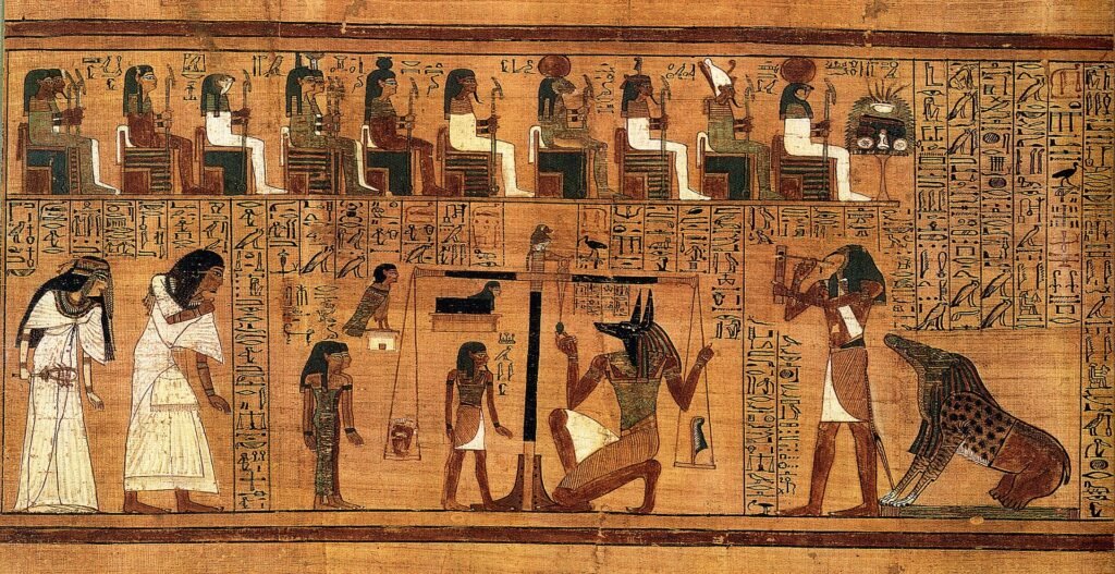 Escena del pesaje del corazon del Libro de los Muertos egipcio, con Anubis ajustando la balanza, Thoth registrando el veredicto, dioses entronizados arriba y Ammit a la derecha