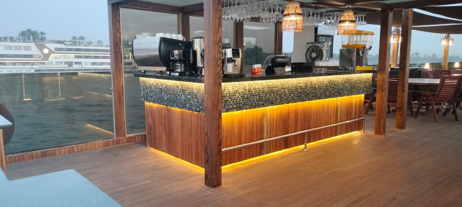 Bar counter on the Iris deck with warm lighting under the counter