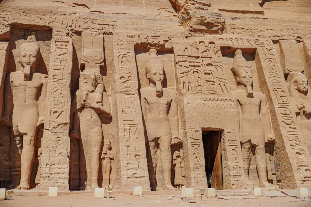 The facade of the small temple at Abu Simbel, with standing statues of Ramesses II and Queen Nefertari