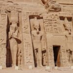 The facade of the small temple at Abu Simbel, with standing statues of Ramesses II and Queen Nefertari