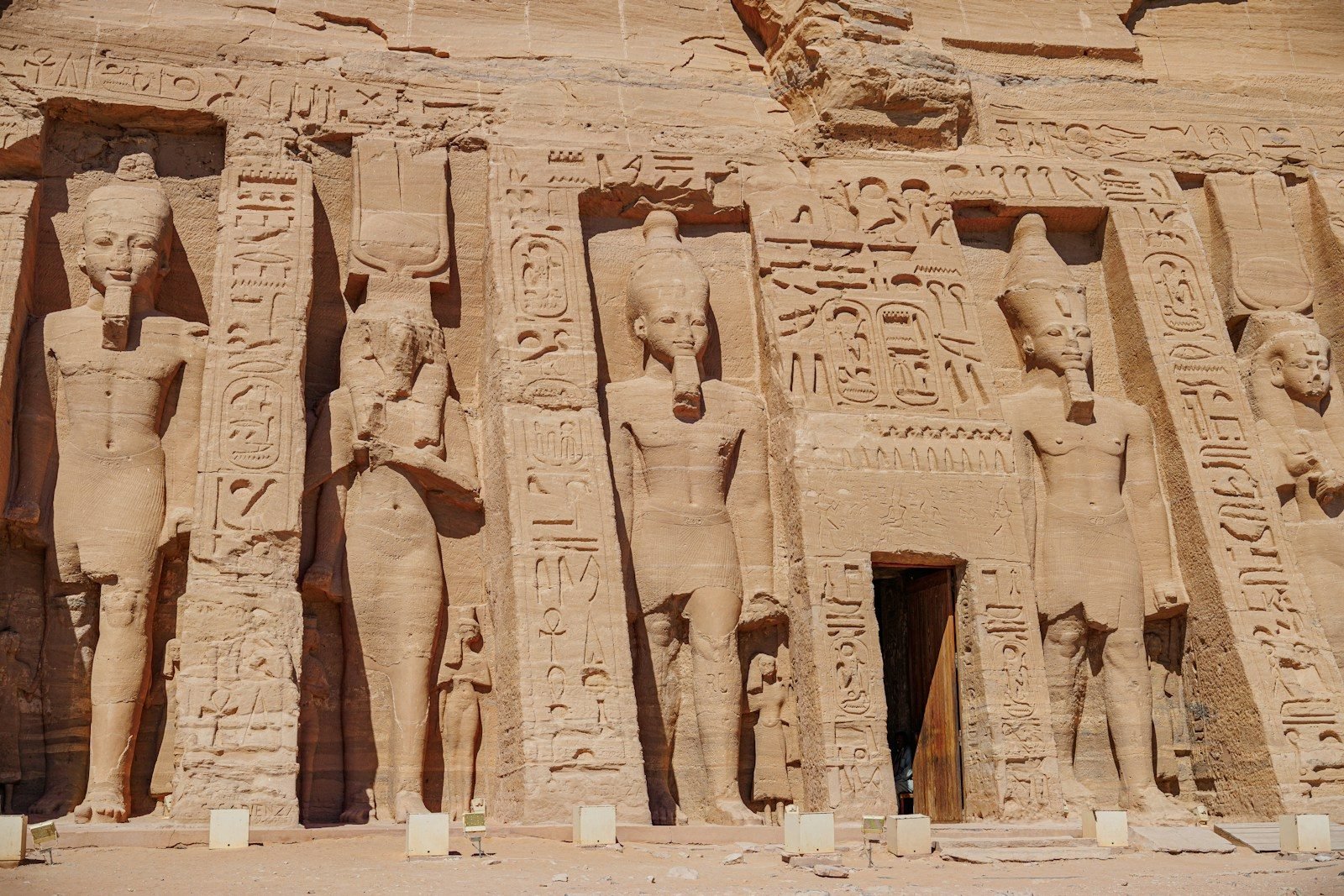 The facade of the small temple at Abu Simbel, with standing statues of Ramesses II and Queen Nefertari