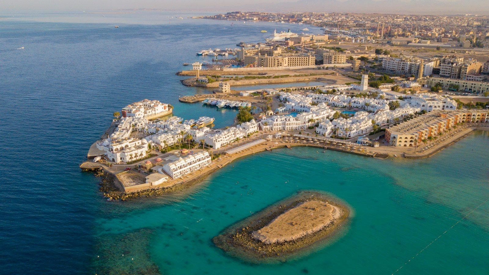 Aerial view of the Hurghada coast, with the marina, the hotels and the turquoise water of the Red Sea