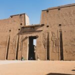 The great pylon of the Temple of Horus at Edfu, carved with the pharaoh before the gods